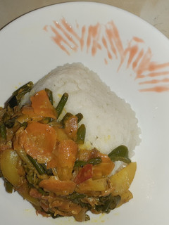 A picture of Rice with vegetables.