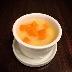 A picture of Delicious Split Yellow Mung Bean Sweet Potato with Coconut Milk Dessert Soup.