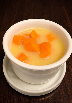 A picture of Delicious Split Yellow Mung Bean Sweet Potato with Coconut Milk Dessert Soup.