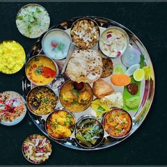 A picture of Indian thalis are the best for family meals.