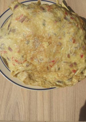 A picture of Sweet potatoes covered with omelette.
