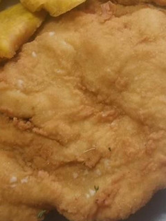 Una foto de Filete de pechugas de pollo empanadas