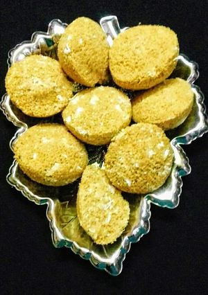 A picture of Gudh Narkoler Mishti Bhapa (Steamed pancake with coconut & jaggery).