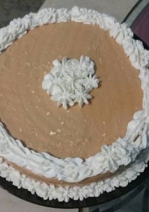 Una foto de Pastel fácil con cubierta de dulce de leche y queso