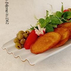 A picture of Kuku Sibzamini (Persian Potato Frittata).