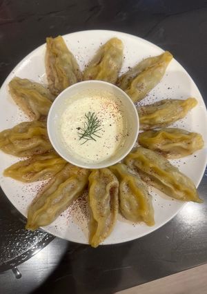 A picture of Manti - Turkish Heaven dumplings - Amazing comfort food and a perfect meal. ENJOY.