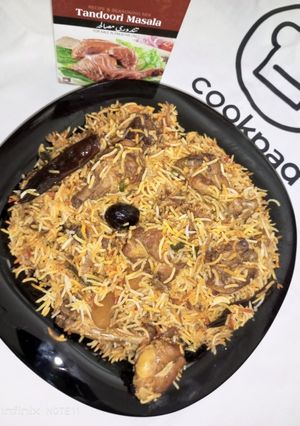 A picture of Tandoori chicken boti biryani.