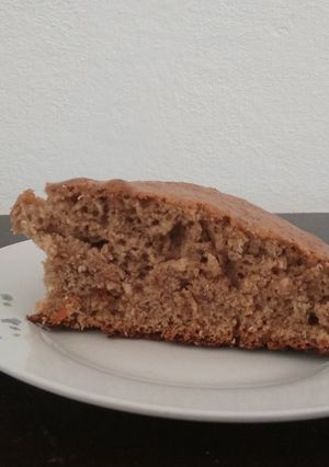 Una foto de Torta de zanahoria, chocolate miel y naranja