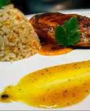 Pechuga de pollo en reducción de parchita y arroz con frutos secos