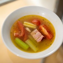 A picture of Minestrone with celery and pork belly.