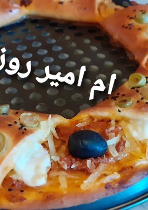 صورة لوصفة بيتزا الشمس بعجينة روعة وشكل راقي🤩