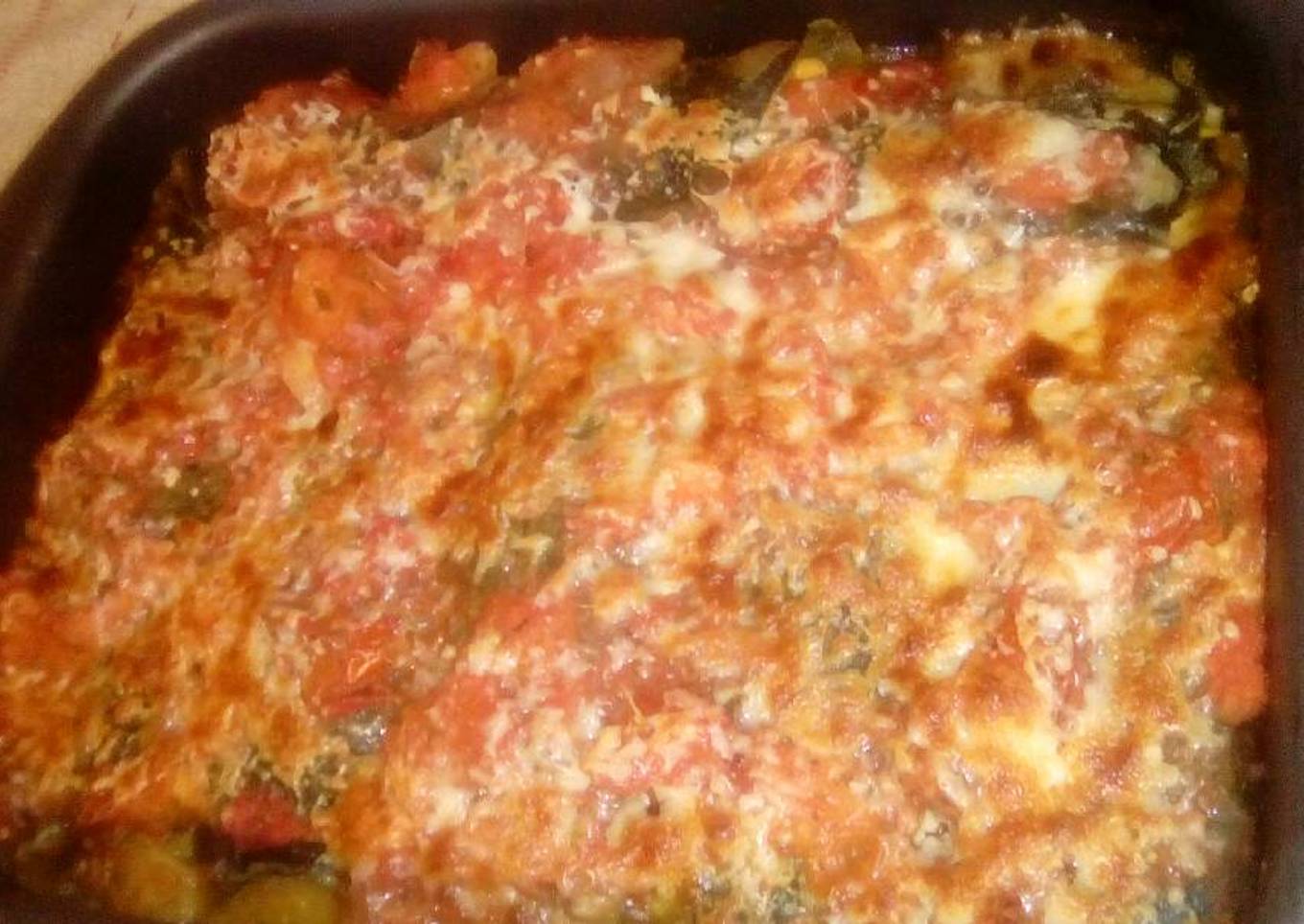 Canelones de panqueques de hojas de remolacha rellenos de puré de calabaza con choclo y cebollas