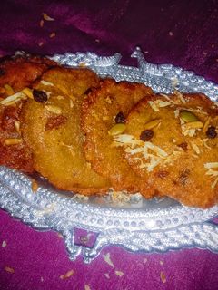 पुआ रेसिपी मुख्य फोटो