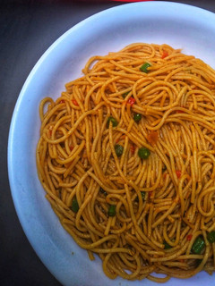 A picture of Jollof spaghetti.
