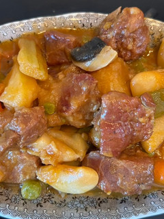 Una foto de Cabeza de lomo con menestra de verduras