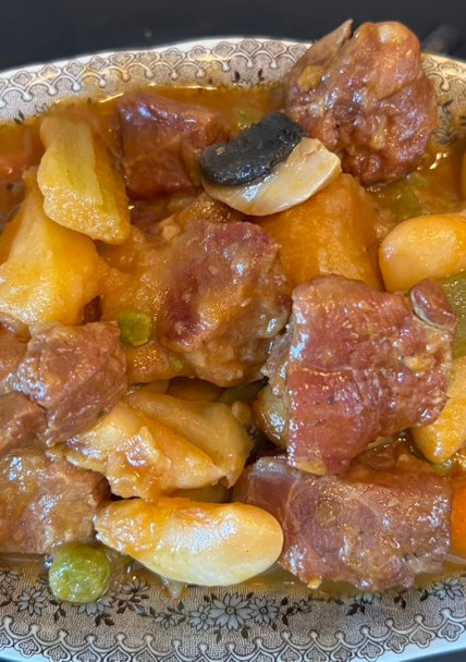 Una foto de Cabeza de lomo con menestra de verduras