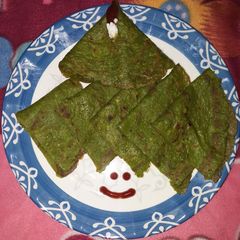 A picture of Spinach and moong dal cheela.