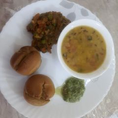 A picture of Winter Special Dal Bati with Brinjal Bharta and Chutney.