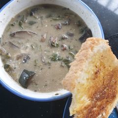 A picture of Vegan Slow Cooker Mushroom and Spinach Soup.
