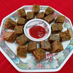 A picture of Kothimbir Vadi (Cilantro Croquettes).