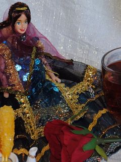 A picture of Persian black tea with dried rose petals.