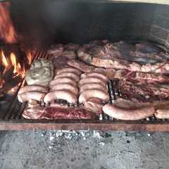Una foto de Asado Argento