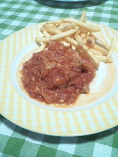 Una foto de Carne con tomate