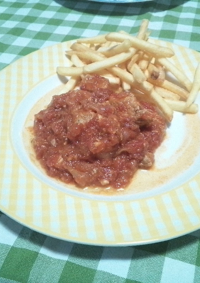 Una foto de Carne con tomate