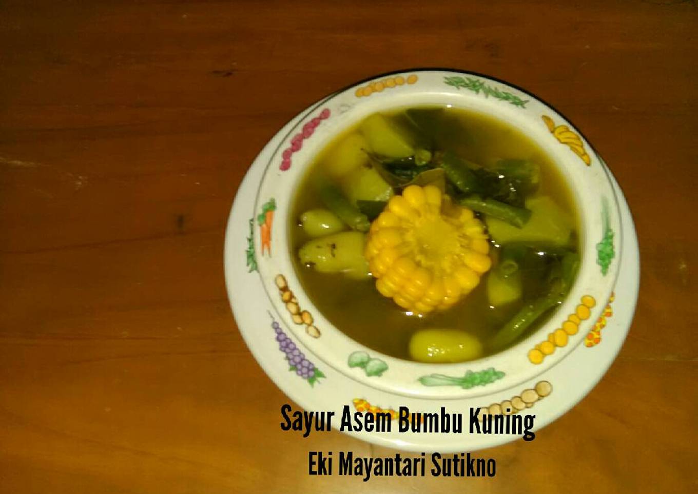 Sayuran asam dengan rasa kuning
