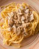 Tallarines con crema y champiñones