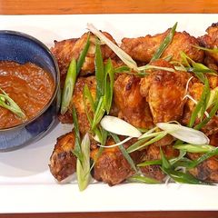A picture of Chicken wings with banana ketchup.