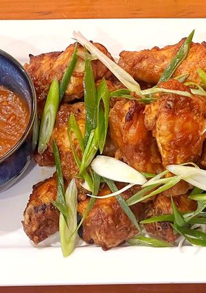 A picture of Chicken wings with banana ketchup.