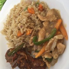 A picture of Coconut fried rice with shredded chicken sauce.
