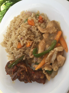 A picture of Coconut fried rice with shredded chicken sauce.