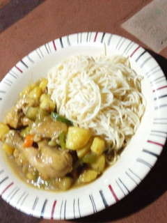 A picture of Chicken sauce with spaghetti.