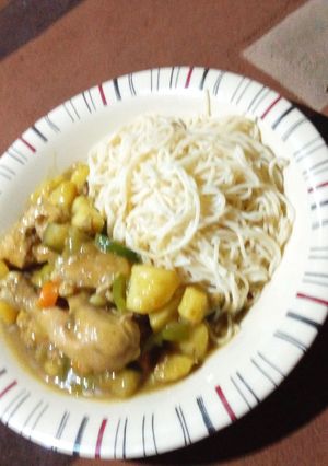 A picture of Chicken sauce with spaghetti.