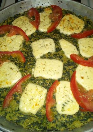 Una foto de Pizza de espinacas y avena