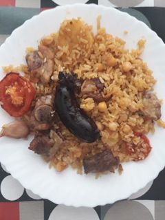 Una foto de Arrós al forn