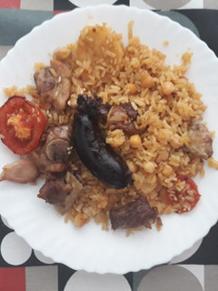 Una foto de Arrós al forn