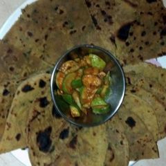 A picture of Paratha with Kerry ka achar.