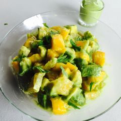 A picture of Avocado, Mango, Orange Salad tossed in an Avocado Salad Dressing.