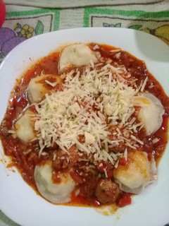 Una foto de Sorrentinos de ricota con tuco