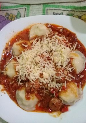 Una foto de Sorrentinos de ricota con tuco