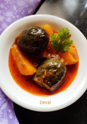 A picture of ભરેલાં રીંગણ બટેટાનું શાક.