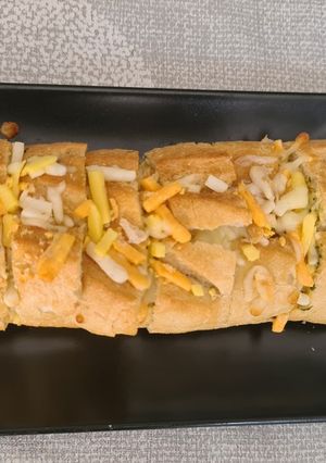 Una foto de Pan de ajo con queso