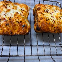 A picture of Cheese loaded sandwich.