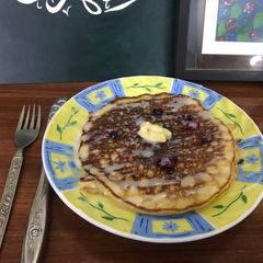 A picture of Fluffy black-current pancakes.