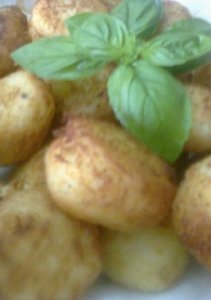 Una foto de Bombas de papa rellenas con mozzarella