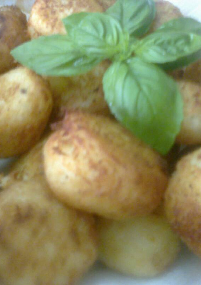 Una foto de Bombas de papa rellenas con mozzarella