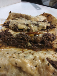 Una foto de Tacos de ternera con queso fundido